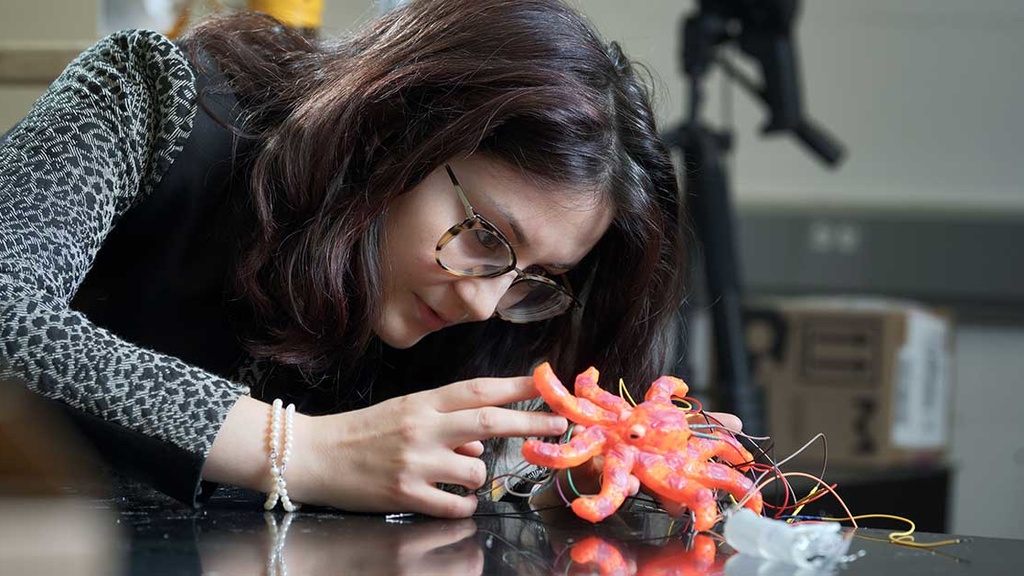 Caterina Lamuta works with the robotic octopus in her lab